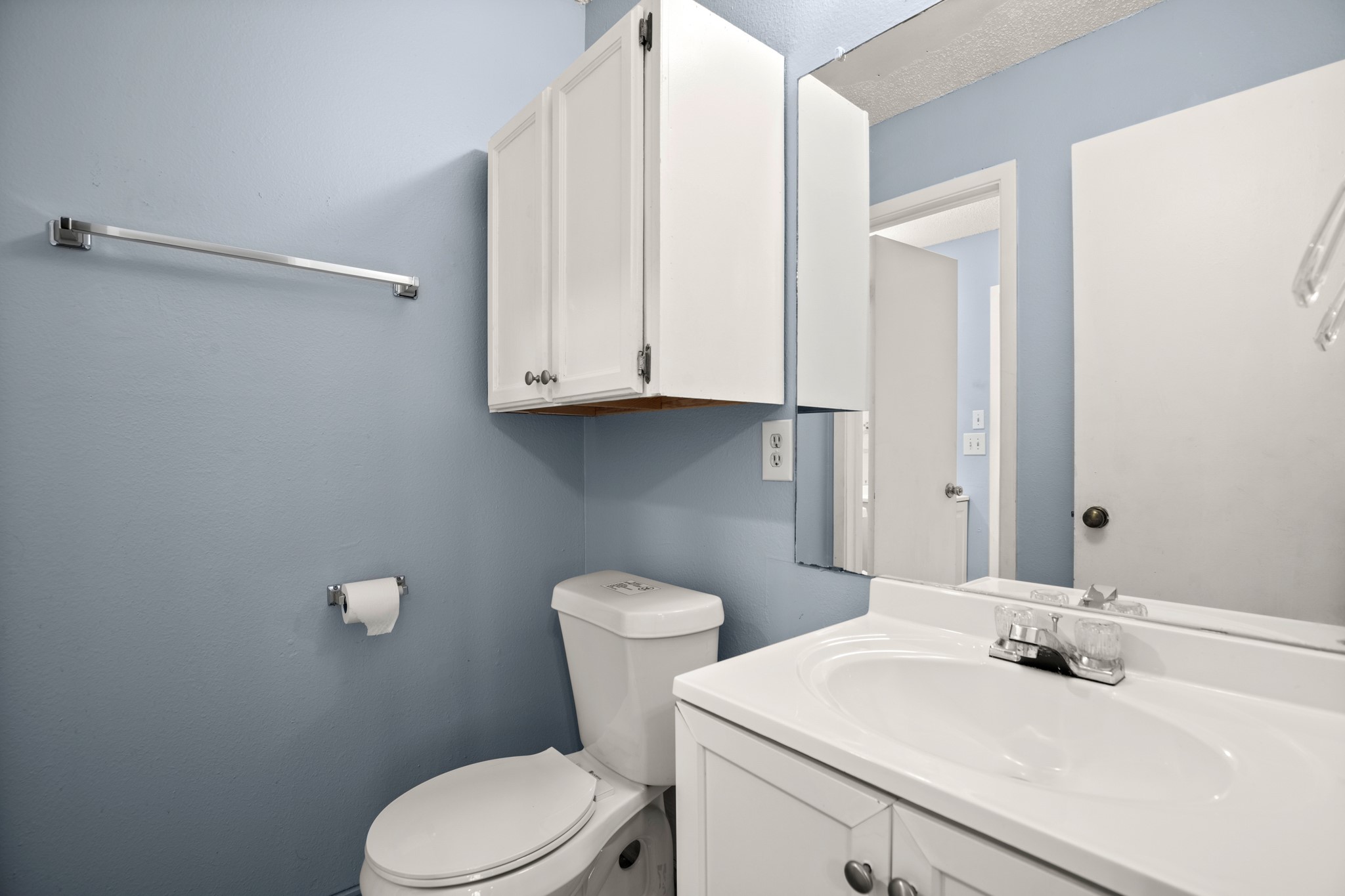 5402 Brompton Circle Austin, TX 78745 - Photo 16 of 30 The bathrooms feature practical layouts designed for everyday convenience.