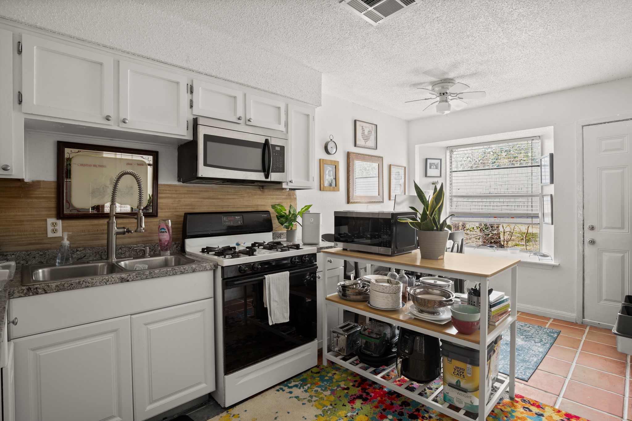 5402 Brompton Circle Austin, TX 78745 - Photo 22 of 30 Unit B's kitchen includes a gas range ideal for everyday cooking.