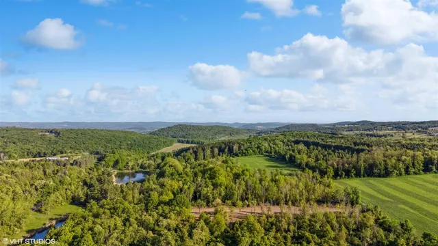 a view of lake with green space