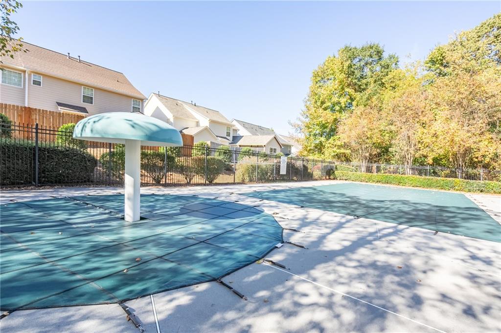 2245 Leicester Way Southeast Atlanta, GA 30316 - Photo 27 of 29 a backyard of a house with table and chairs
