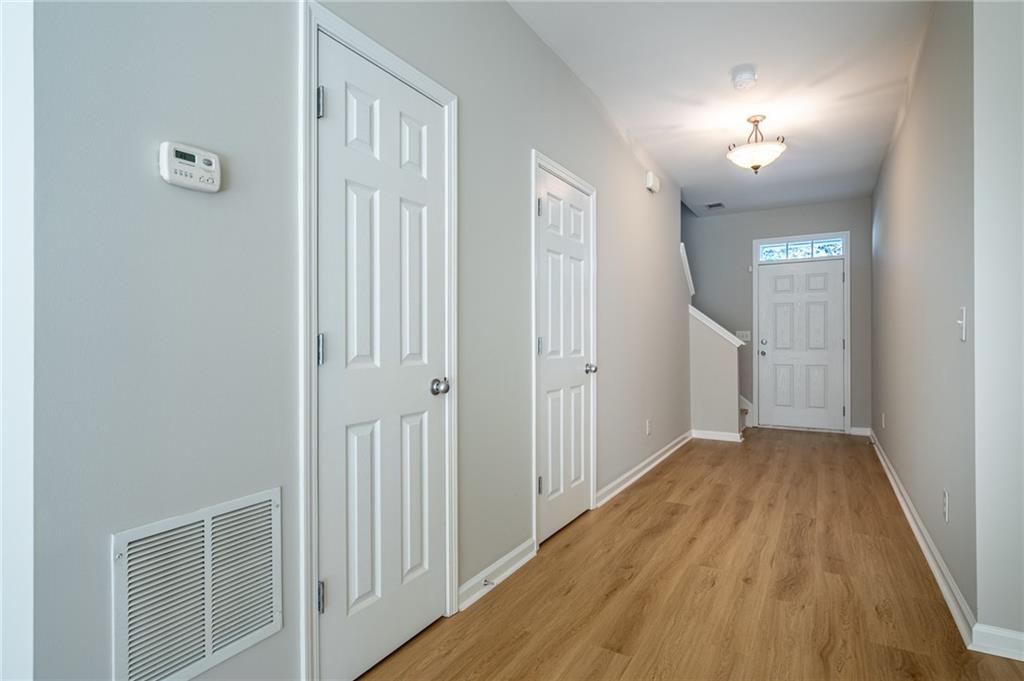 2245 Leicester Way Southeast Atlanta, GA 30316 - Photo 4 of 29 a view of a hallway with wooden floor