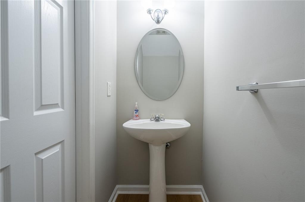 2245 Leicester Way Southeast Atlanta, GA 30316 - Photo 5 of 29 a bathroom with a sink a mirror and shower