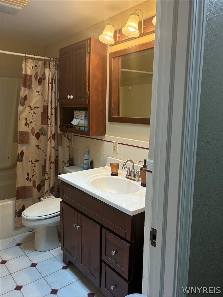 3979 Ridge Lea Drive Newfane, NY 14094 - Photo 23 of 50 VANITY HALL BATHROOM