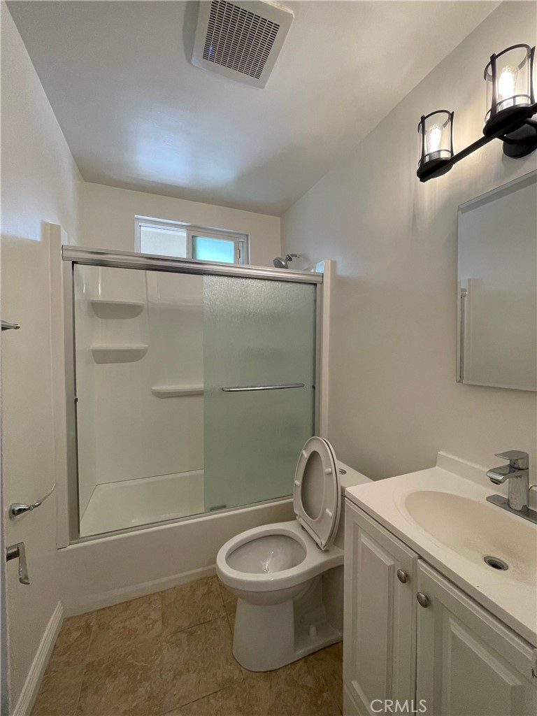 1349 North Altadena Drive, Unit B Pasadena, CA 91107 - Photo 5 of 8 a bathroom with a toilet a sink and shower