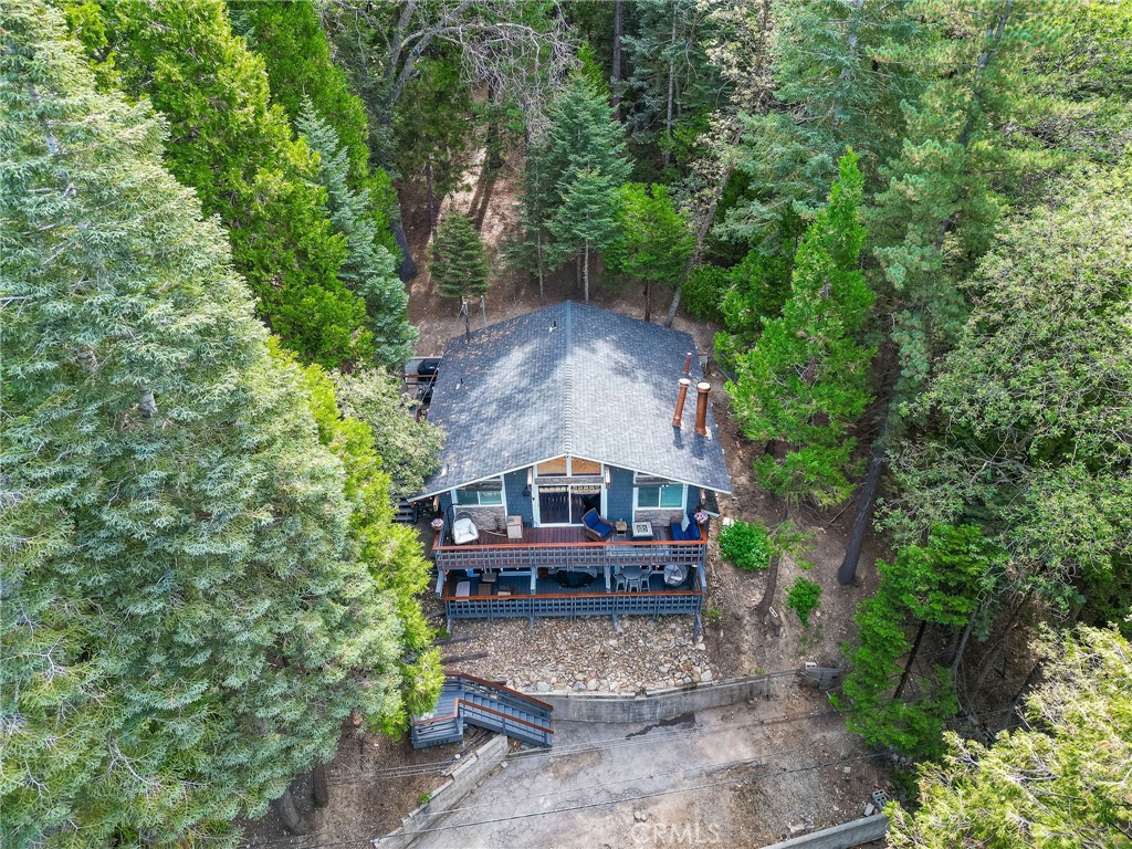 26669 Highway 189 Twin Peaks, CA 92391 - Photo 2 of 68 front view of a house with a yard
