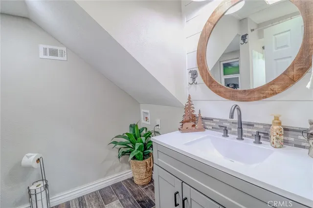 a view of balcony with couch and wooden floor