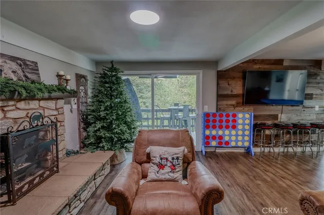 a balcony view with two chairs and a table