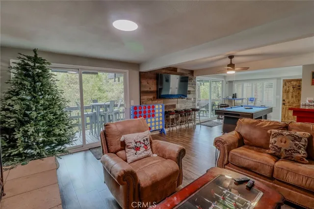 a balcony view with two chairs and a table