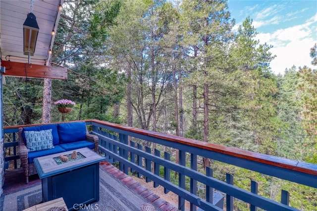 a view of balcony with wooden floor