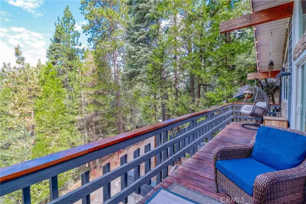 a backyard of a house with large tree