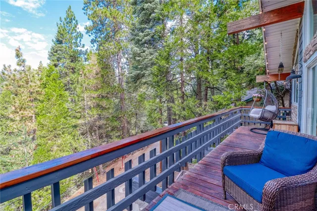 a backyard of a house with large tree
