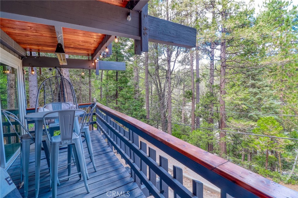 26669 Highway 189 Twin Peaks, CA 92391 - Photo 58 of 68 a view of balcony with wooden floor