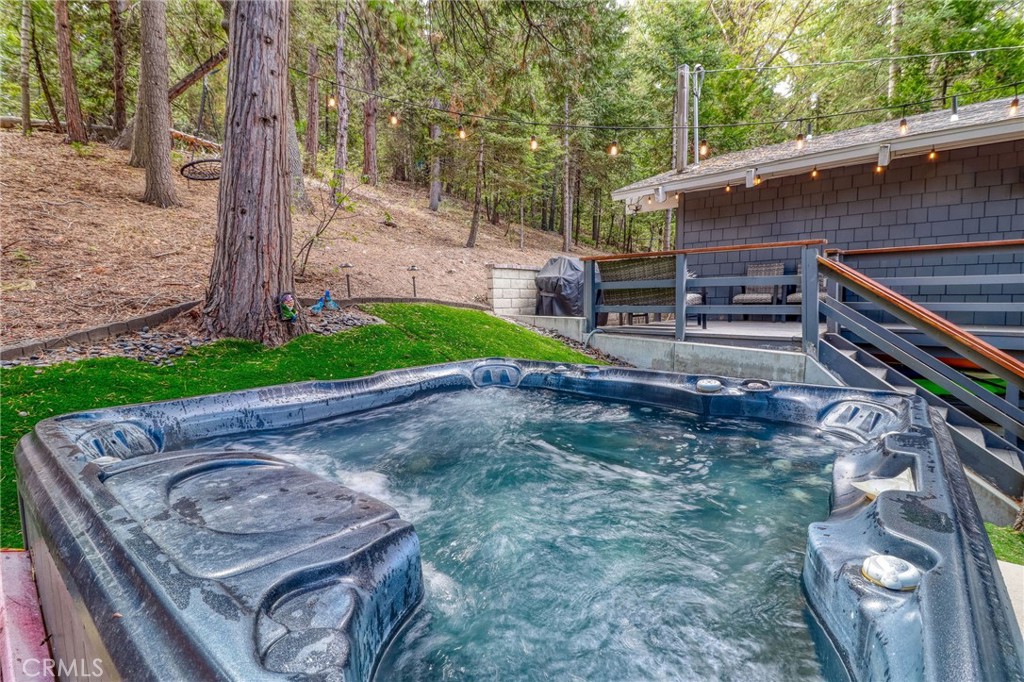 26669 Highway 189 Twin Peaks, CA 92391 - Photo 60 of 68 a view of a backyard with sitting area