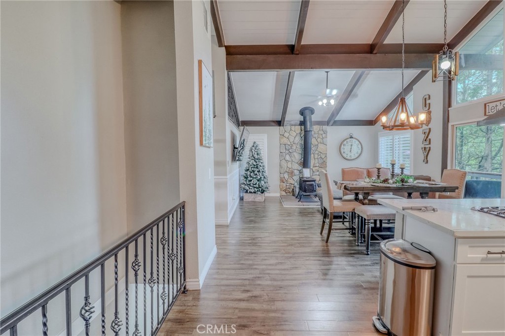 26669 Highway 189 Twin Peaks, CA 92391 - Photo 6 of 68 a view of a dining room with furniture window and wooden floor