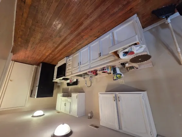 a room with storage and utility