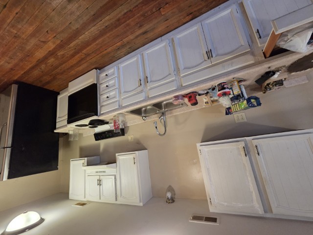 303 3rd Street Kell, IL 62853 - Photo 17 of 23 a room with storage and utility