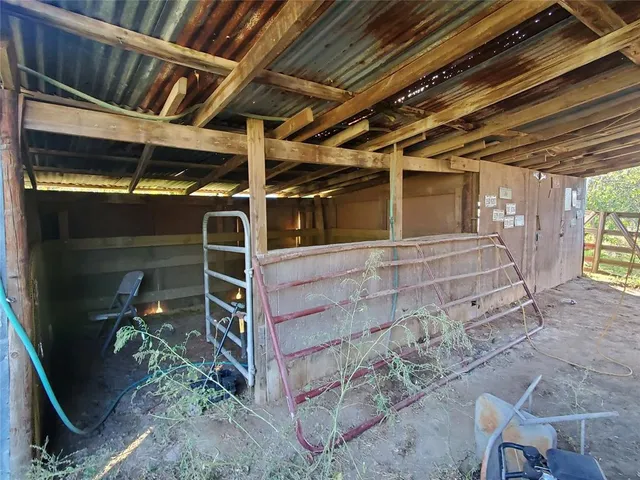 a view of room with wooden ceiling