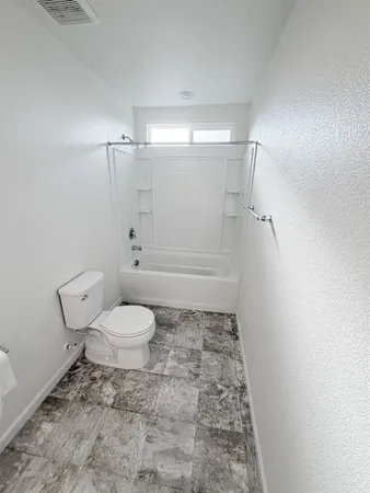 a view of a storage & utility room in a house