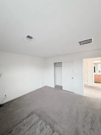 a view of livingroom with furniture and a window