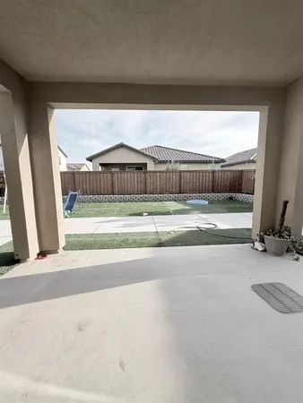 a house view with a outdoor space