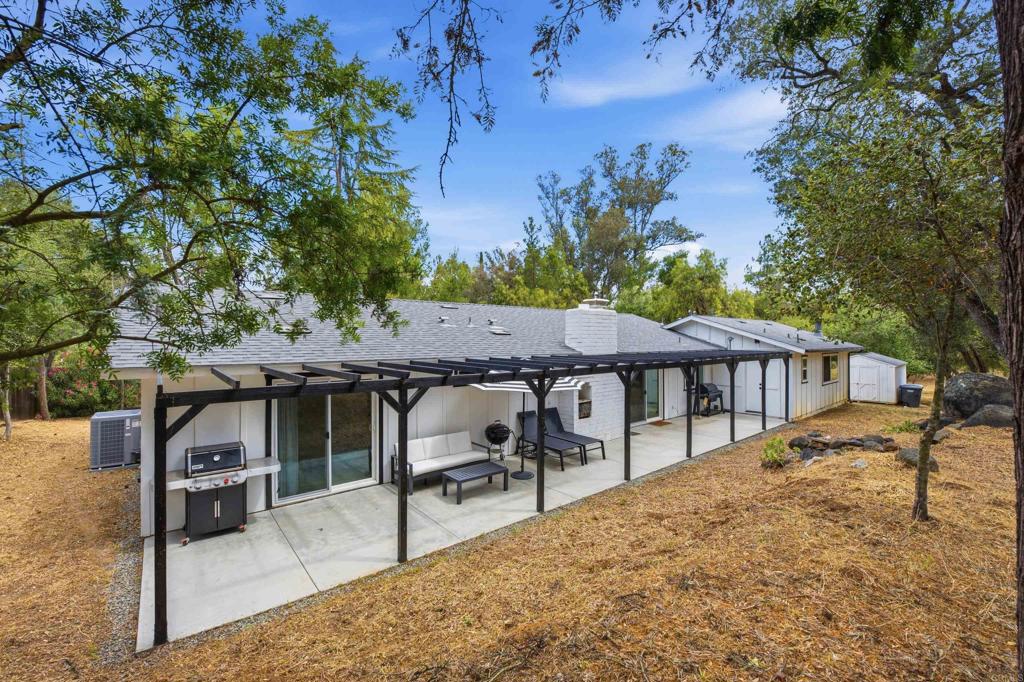 1878 Rancho Jorie Alpine, CA 91901 - Photo 27 of 70 a view of a patio with wooden floor