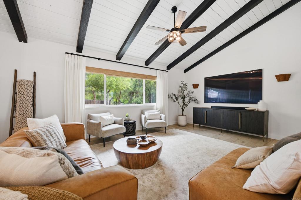 1878 Rancho Jorie Alpine, CA 91901 - Photo 5 of 70 a living room with furniture and a flat screen tv