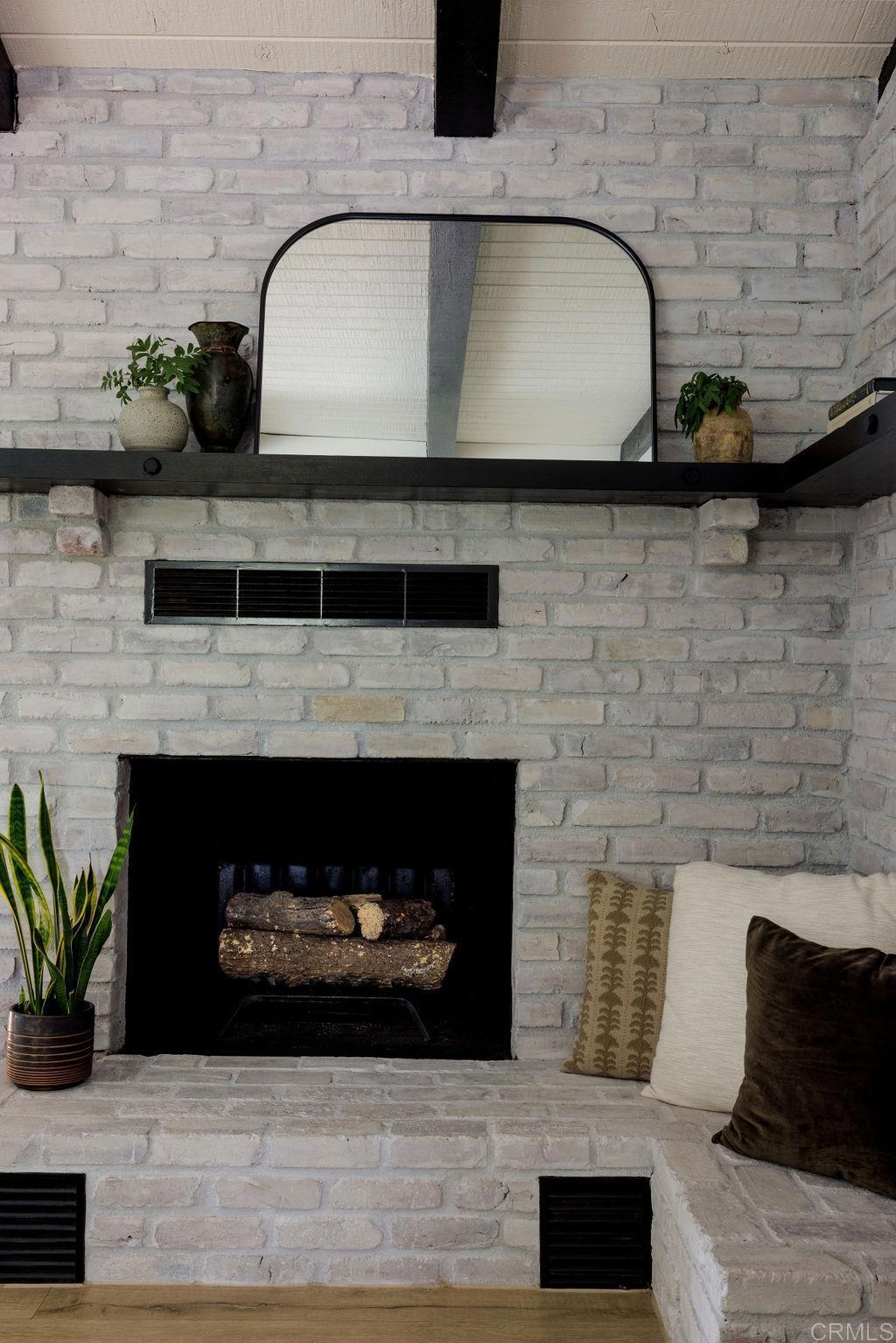 1878 Rancho Jorie Alpine, CA 91901 - Photo 63 of 70 a living room with a fireplace