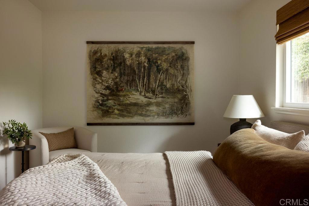 1878 Rancho Jorie Alpine, CA 91901 - Photo 64 of 70 a bedroom with a bed and a painting on the wall