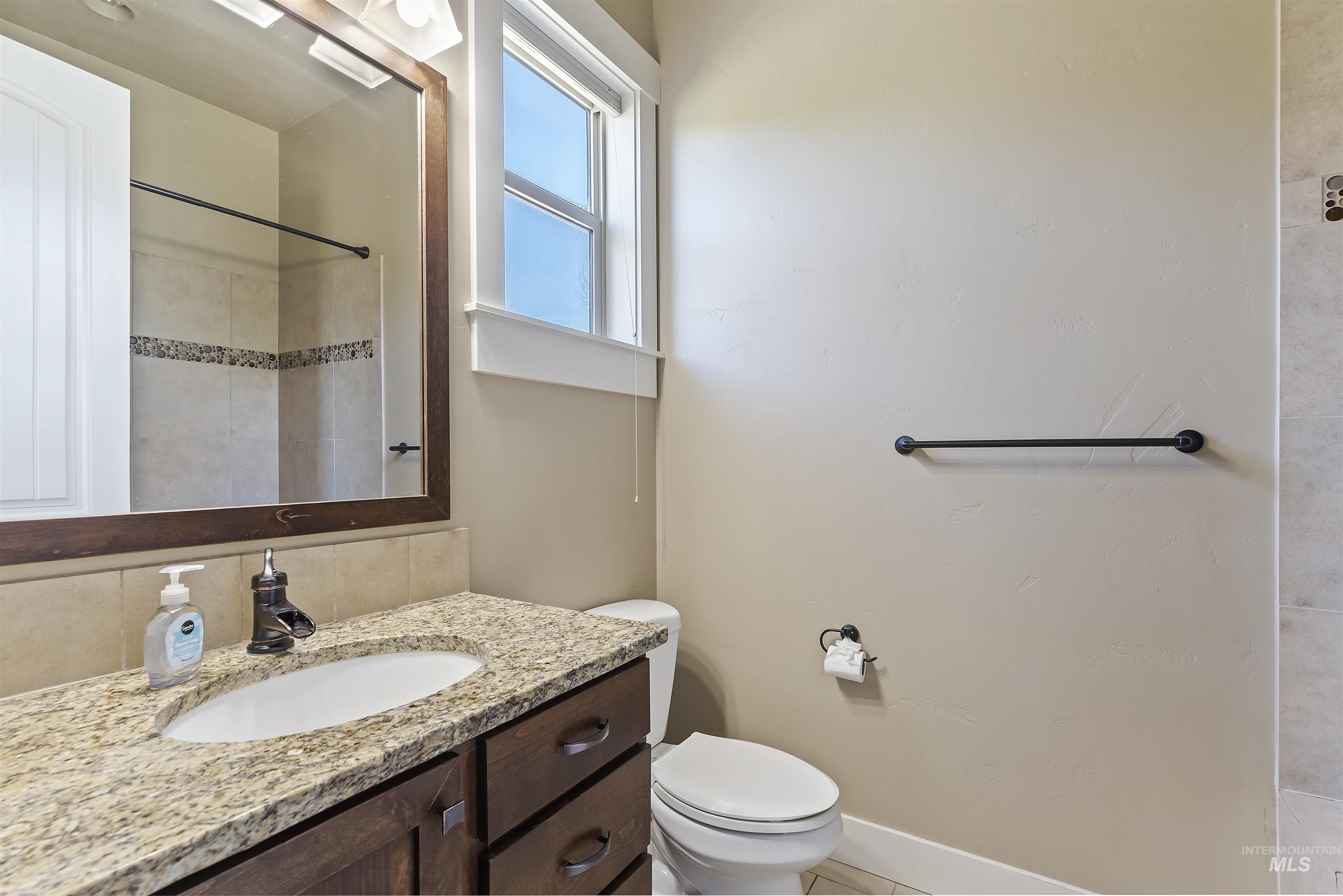 24710 Blessinger Road Star, ID 83669 - Photo 24 of 46 Full bath with vanity and a shower