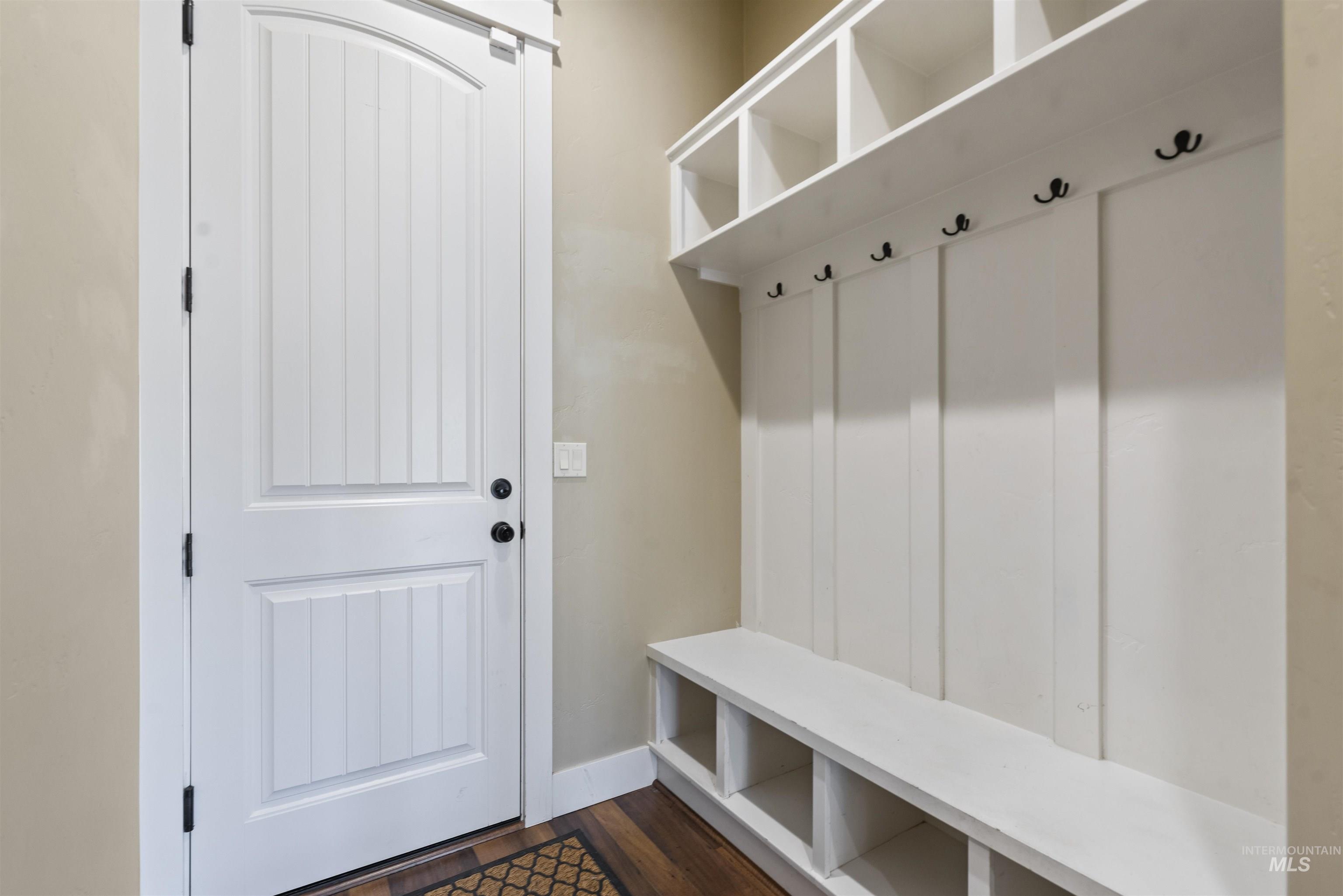 24710 Blessinger Road Star, ID 83669 - Photo 27 of 46 Mudroom with dark wood-type flooring and baseboards