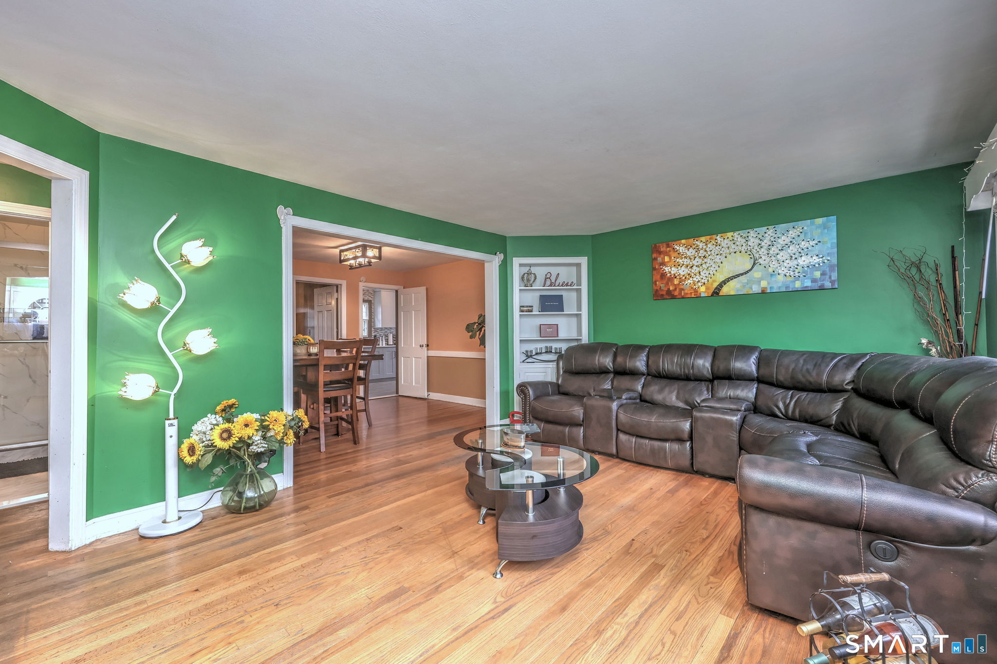 59 Hayward Road Hamden, CT 06514 - Photo 3 of 26 Spacious living room with hard wood floors throughout living room, dining room and bedrooms!