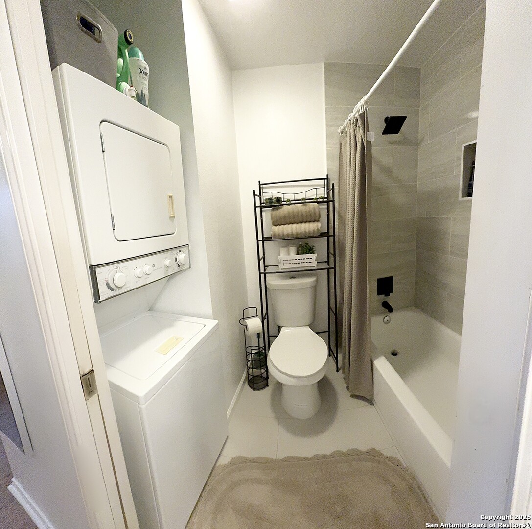4803 Hamilton Wolfe Road, Unit 310 San Antonio, TX 78229 - Photo 5 of 5 a bathroom with a toilet and a shower