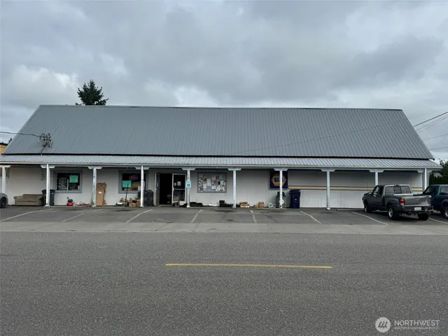a view of car parked in front of building