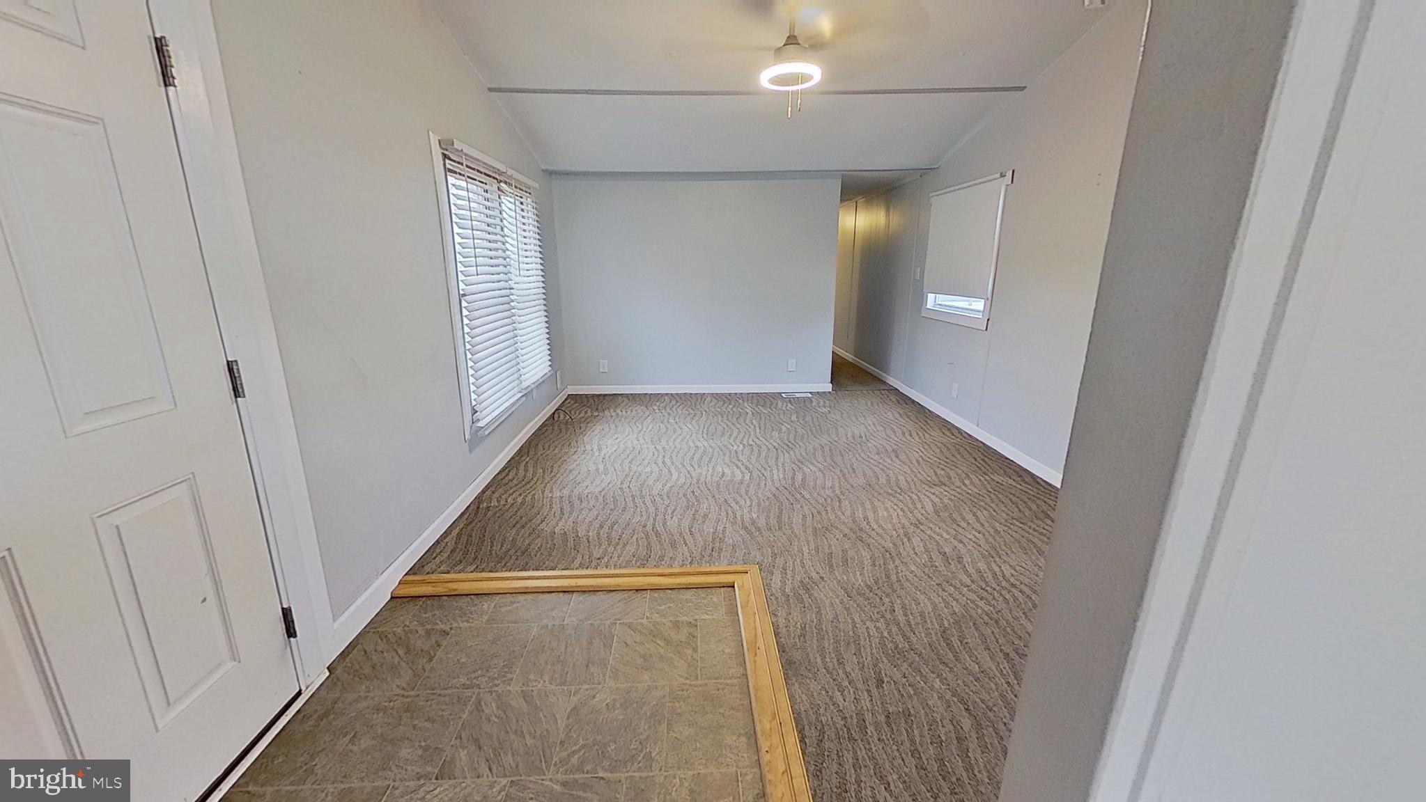 450 Ridge Road, Unit 16 Etters, PA 17319 - Photo 3 of 6 a view of a hallway with wooden floor