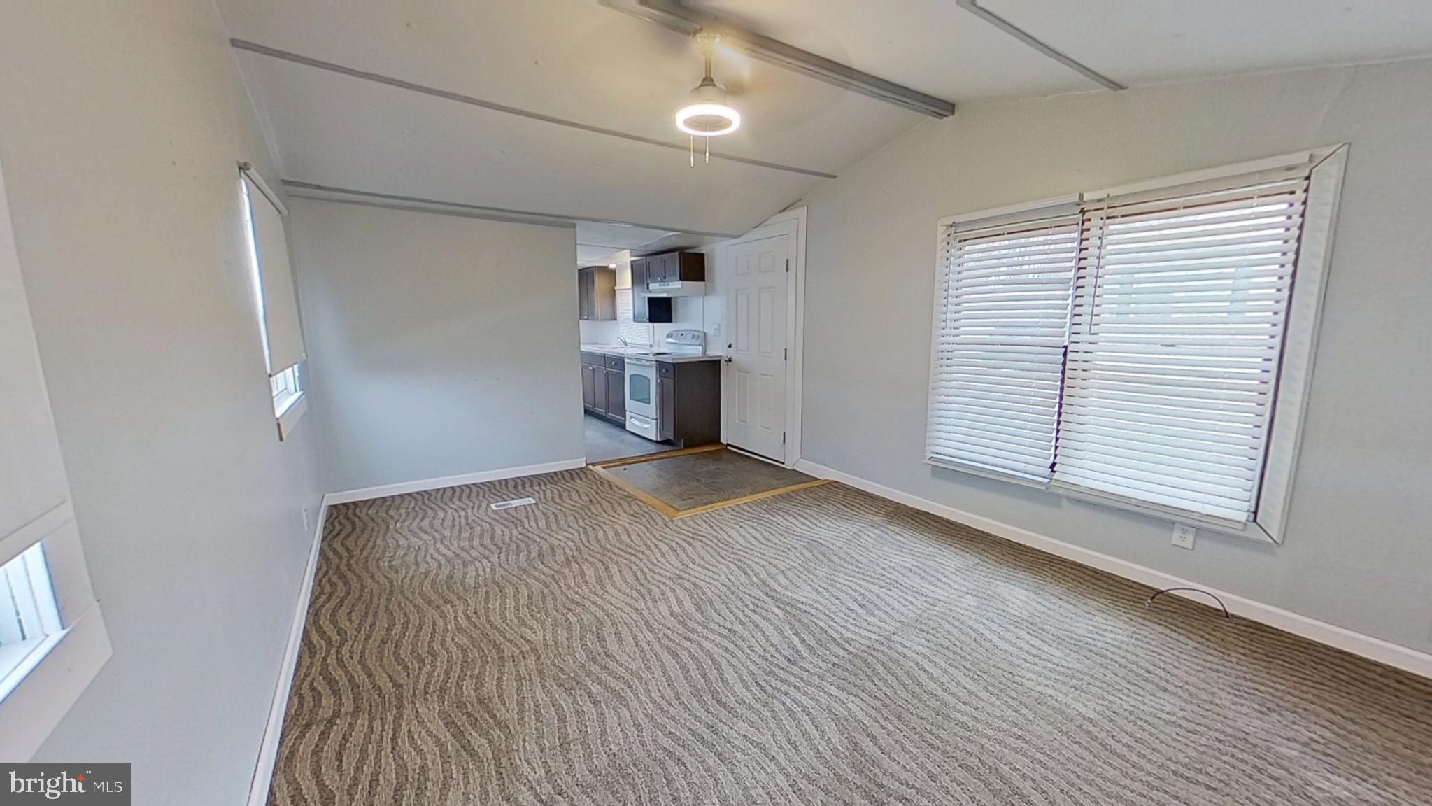 450 Ridge Road, Unit 16 Etters, PA 17319 - Photo 4 of 6 a view of a kitchen with a sink and a window