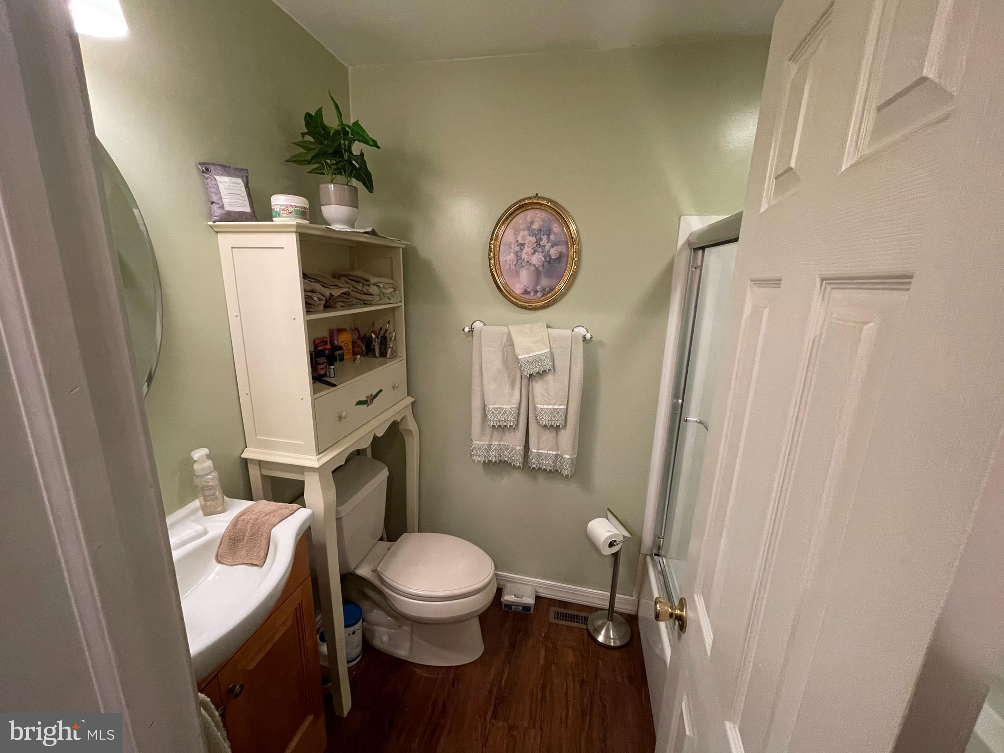 12014 Tyrone Road Philadelphia, PA 19154 - Photo 12 of 32 a bathroom with a toilet a sink and a shower