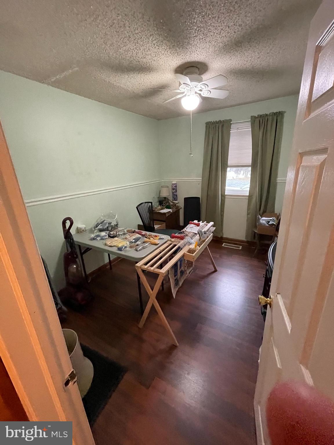 12014 Tyrone Road Philadelphia, PA 19154 - Photo 13 of 32 a living room with furniture and a chandelier