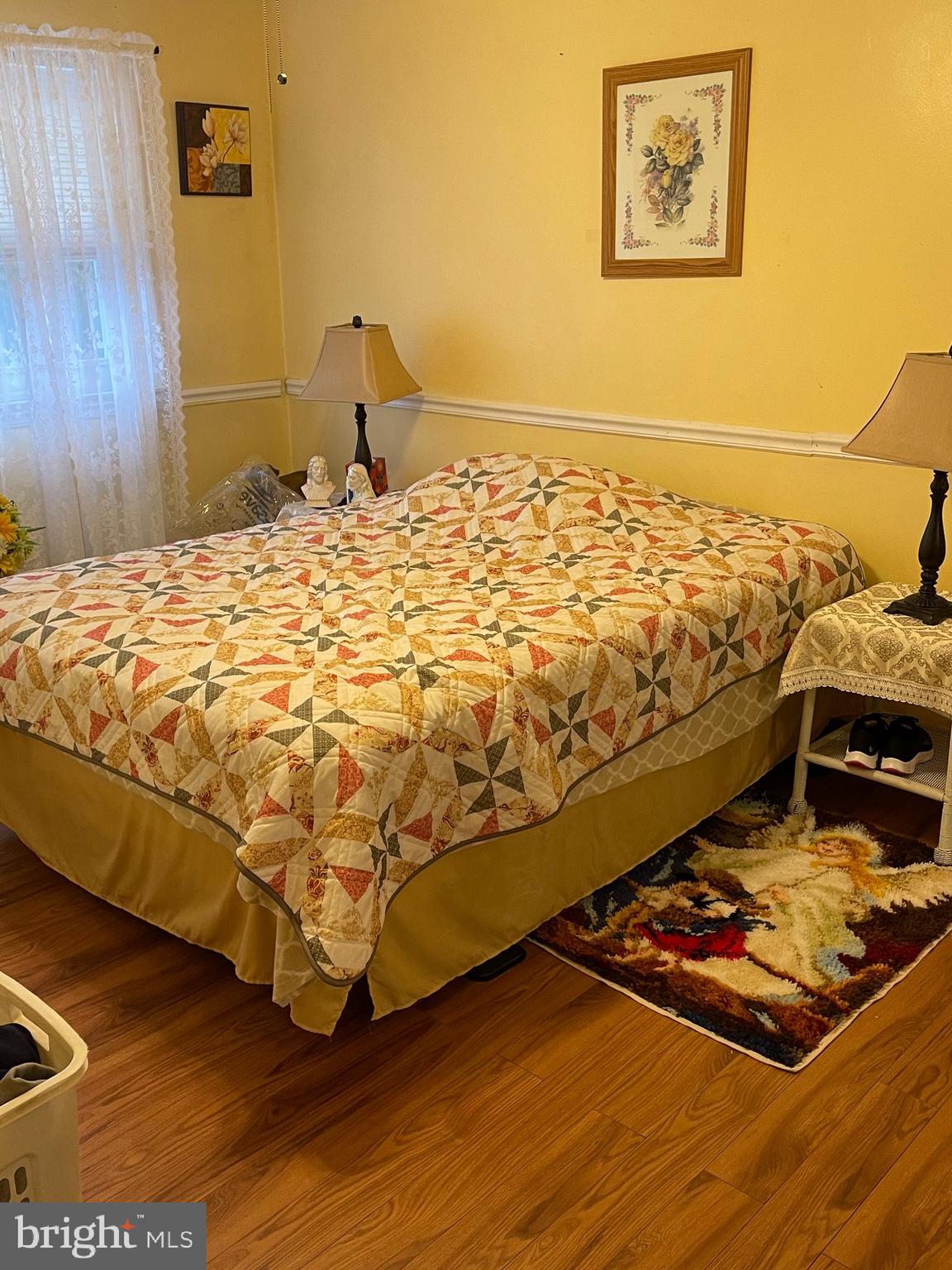 12014 Tyrone Road Philadelphia, PA 19154 - Photo 15 of 32 a bedroom with a bed