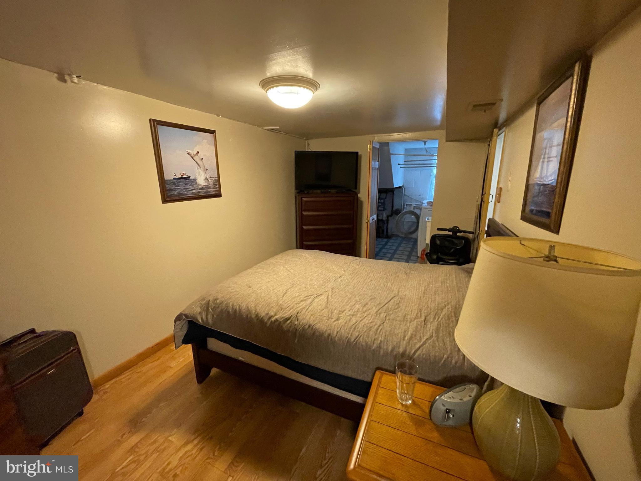 12014 Tyrone Road Philadelphia, PA 19154 - Photo 21 of 32 a bedroom with a bed and furniture