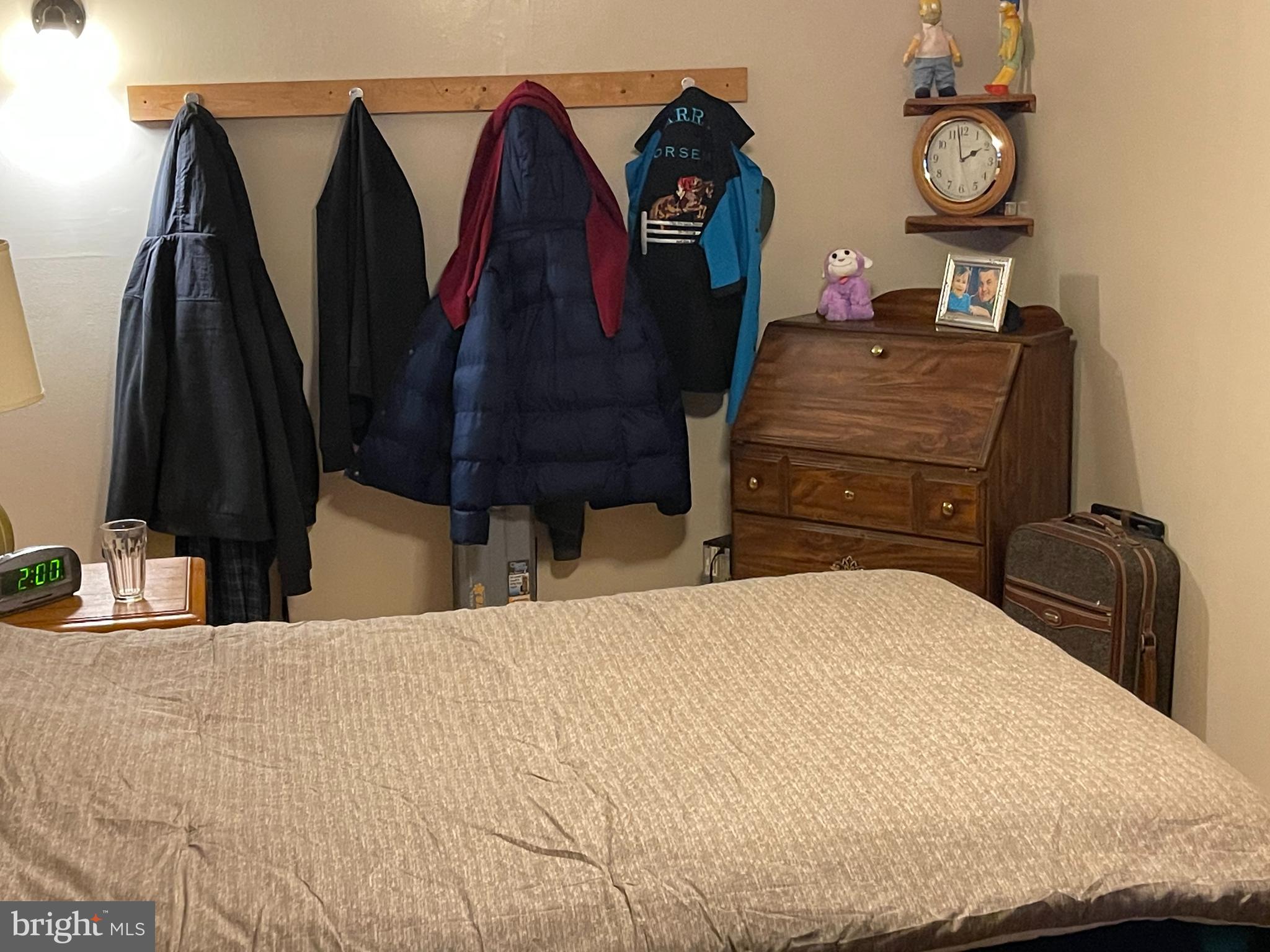 12014 Tyrone Road Philadelphia, PA 19154 - Photo 26 of 32 a bedroom with a bed and dresser