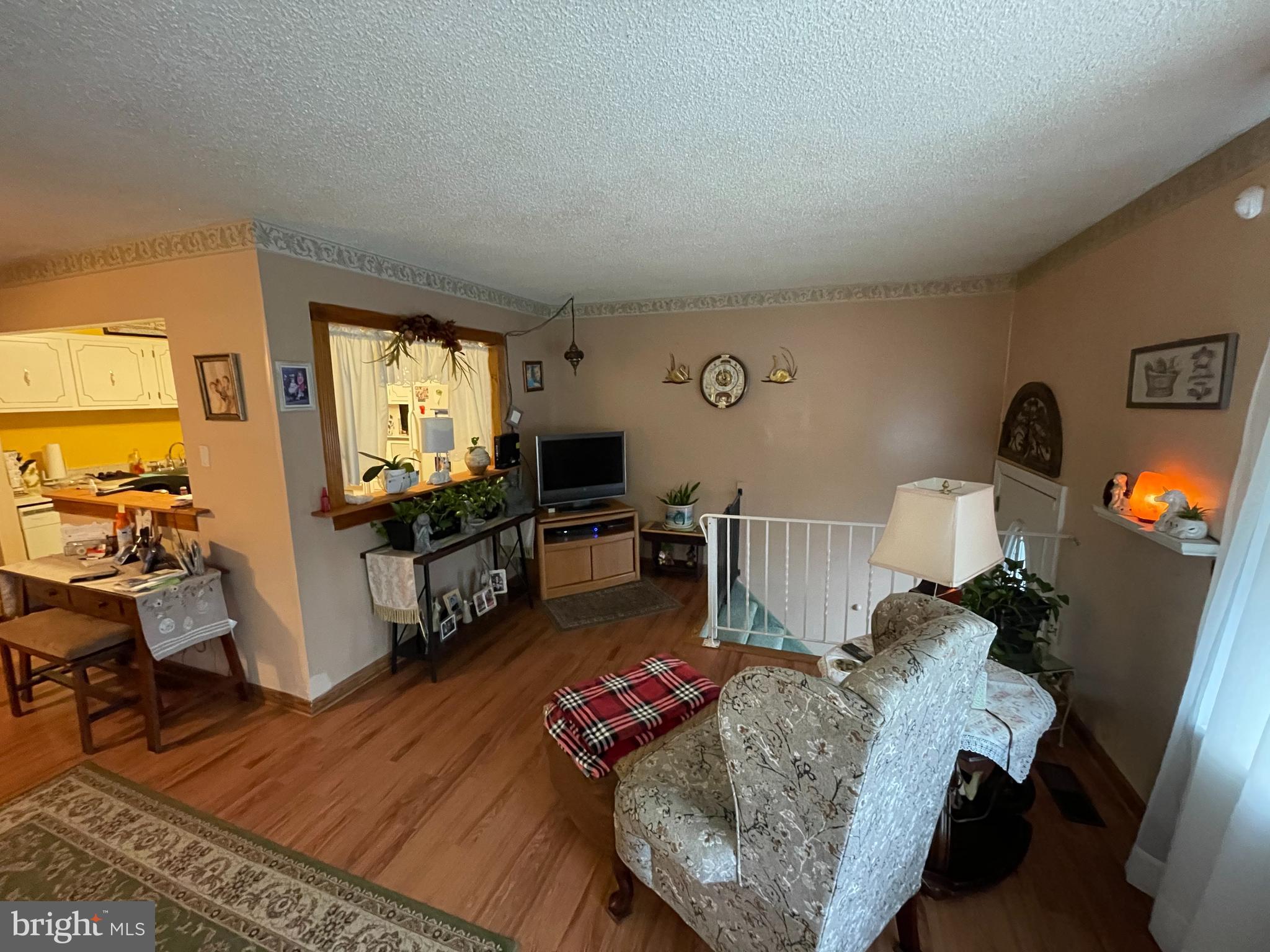 12014 Tyrone Road Philadelphia, PA 19154 - Photo 5 of 32 a living room with furniture and a flat screen tv