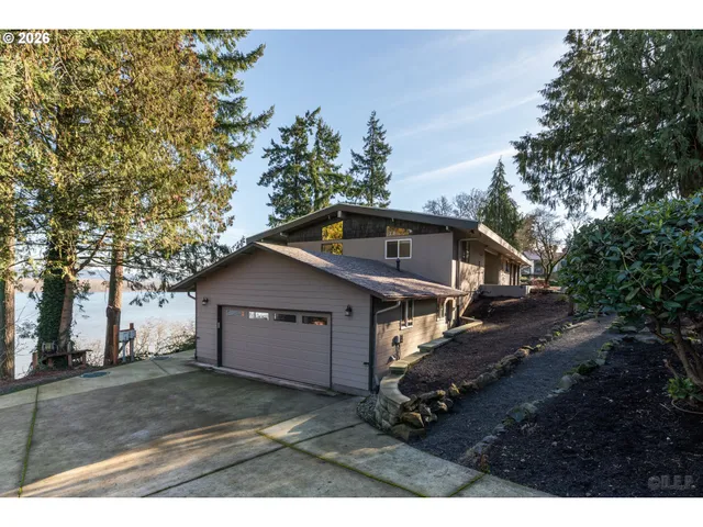 a house with trees in the background