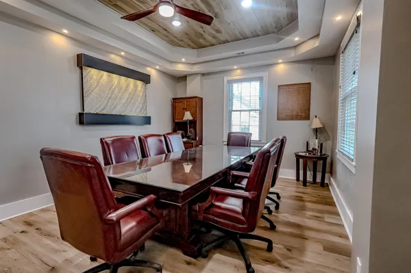 a view of a dining room with furniture