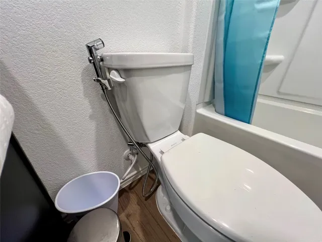 a bathroom with a toilet