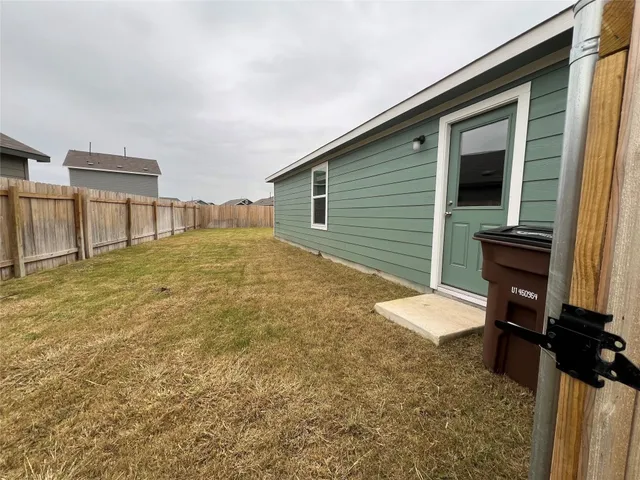 a view of backyard of house