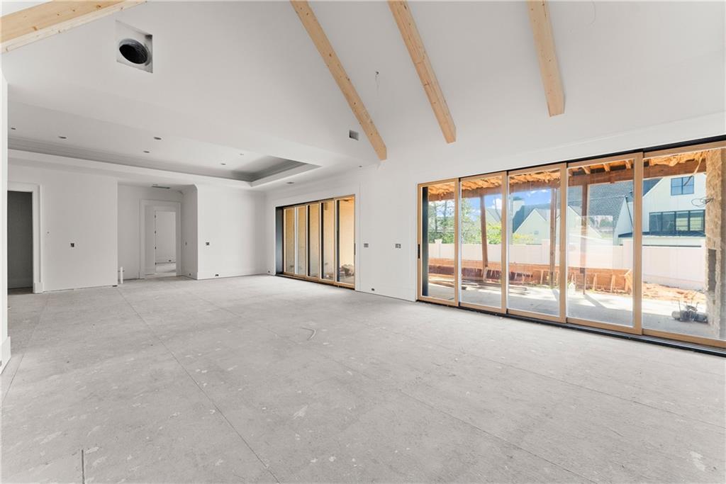 5071 Kings Cl Alpharetta, GA 30004 - Photo 11 of 53 a view of an empty room with a large window