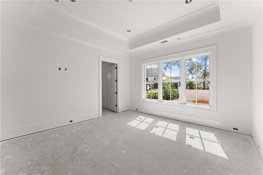 5071 Kings Cl Alpharetta, GA 30004 - Photo 17 of 53 a view of an empty room with a window