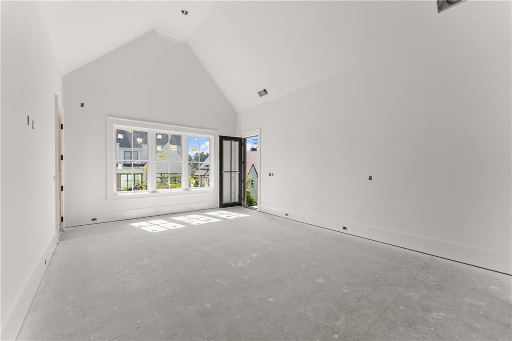 5071 Kings Cl Alpharetta, GA 30004 - Photo 20 of 53 a view of an empty room with a window