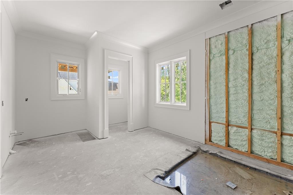 5071 Kings Cl Alpharetta, GA 30004 - Photo 24 of 53 an empty room with windows