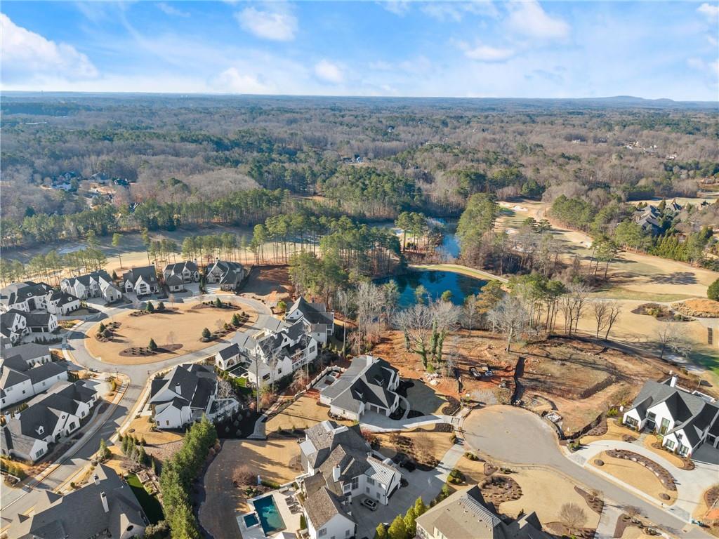 5071 Kings Cl Alpharetta, GA 30004 - Photo 38 of 53 an aerial view of residential building and lake
